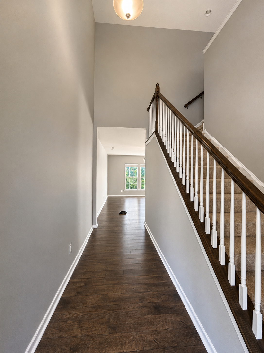 Interior Painting — Two-Story Hallway & Living Room
